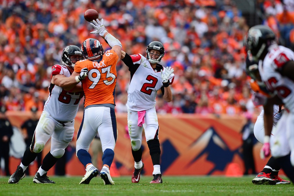 DENVER, CO - OCTOBER 9:  Quarterback Matt Ryan #2 of the Atlanta Falcons throws a touchdown pass in the third quarter of the game against the Denver Broncos at Sports Authority Field at Mile High on October 9, 2016 in Denver, Colorado. (Photo by Dustin Bradford/Getty Images)
