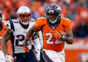 DENVER, CO - JANUARY 24:  C.J. Anderson #22 of the Denver Broncos runs with the ball in the second half against the New England Patriots in the AFC Championship game at Sports Authority Field at Mile High on January 24, 2016 in Denver, Colorado.  (Photo by Ezra Shaw/Getty Images)