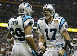 HOUSTON, TX - FEBRUARY 1:  Quarterback Jake Delhomme #17 of the Carolina Panthers celebrates with Steve Smith #89 after Smith caught a 5-yard touchdown pass in the second quarter during Super Bowl XXXVIII agains the New England Patriots at Reliant Stadium on February 1, 2004 in Houston, Texas. (Photo by Donald Miralle/Getty Images)
