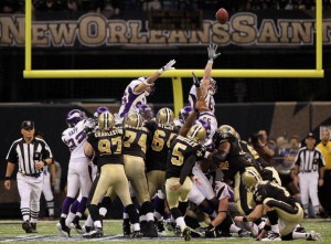 NEW ORLEANS - JANUARY 24:  Kicker Garrett Hartley #5 of the New Orleans Saints kicks a game winning field goal in overtime against the Minnesota Vikings to win the NFC Championship Game at the Louisiana Superdome on January 24, 2010 in New Orleans, Louisiana.  (Photo by Jed Jacobsohn/Getty Images)