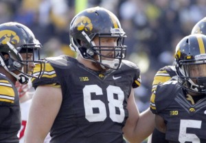 IOWA CITY, IA - NOVEMBER 2:  Offensive lineman Brandon Scherff #68 of the Iowa Hawkeyes during a break in the action in the third quarter against the Wisconsin Badgers on November 2, 2013 at Kinnick Stadium in Iowa City, Iowa. Wisconsin won 28-9. (Photo by Matthew Holst/Getty Images)