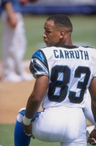 SAN DIEGO - SEPTEMBER 14:  Rae Carruth #83 of the Carolina Panthers looks on from the sidelines during a game against the San Diego Chargers on September 14, 1997 at Qualcomm Stadium in San Diego, California.  The Panthers defeated the Chargers 26-7. (Photo by Craig Jones/Getty Images)