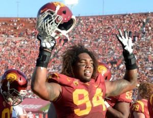 LOS ANGELES, CA - AUGUST 30:  Defensive end Leonard Williams #94 of the USC Trojans celebrates his interception during the second quarter against the Fresno State Bulldogs at Los Angeles Memorial Coliseum on August 30, 2014 in Los Angeles, California.  (Photo by Harry How/Getty Images)