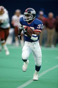 EAST RUTHERFORD, NJ - OCTOBER 28:  Running back Dave Meggett #30 of the New York Giants runs with the ball during a game against the Washington Redskins at Giants Stadium October 28, 1990 in East Rutherford, New Jersey.  The Giants won 21-10.  (Photo by George Rose/Getty Images)
