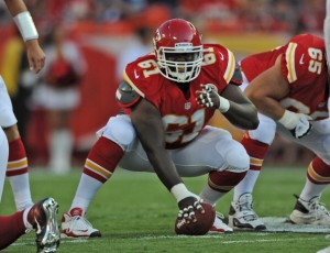 KANSAS CITY, MO - AUGUST 10:  Center Rodney Hudson #61 of the Kansas City Chiefs gets set at the line against the Arizona Cardinals during the first half on August 10, 2012 at Arrowhead Stadium in Kansas City, Missouri.  (Photo by Peter Aiken/Getty Images)