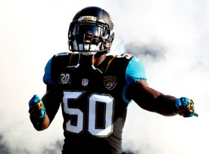 JACKSONVILLE, FL - AUGUST 28:  Telvin Smith #50 of the Jacksonville Jaguars enters the stadium before the preseason NFL game against the Atlanta Falcons at EverBank Field on August 28, 2014 in Jacksonville, Florida.  (Photo by Sam Greenwood/Getty Images)
