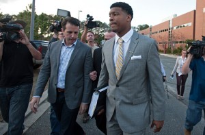 TALLAHASSEE, FL - DECEMBER 2: Florida State Seminoles quaterback Jameis Winston leaves his student conduct code hearing on December 2, 2014 in Tallahassee, Florida. The hearing will continue on Wednesday December 3rd. (Photo by Jeff Gammons/Getty Images)