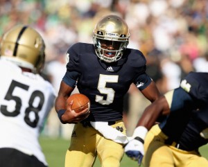 SOUTH BEND, IN - SEPTEMBER 08: Everett Golson #5 of the Notre Dame Fighting Irish runs around end to try to score a touchdwon against the Purdue Boilermakers at Notre Dame Stadium on September 8, 2012 in South Bend, Indiana. (Photo by Jonathan Daniel/Getty Images)