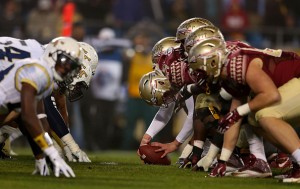 CHARLOTTE, NC - DECEMBER 06:  The Florida State Seminoles prepare to snap the ball for their first extra point attempt against the Georgia Tech Yellow Jackets in the 1st quarter during the ACC Championship game on December 6, 2014 in Charlotte, North Carolina.  (Photo by Mike Ehrmann/Getty Images)