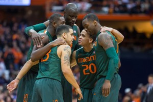 SYRACUSE, NY - JANUARY 24:  The Miami Hurricanes players meet on the court seconds before their win over Syracuse Orange on January 24, 2015 at The Carrier Dome in Syracuse, New York.  Miami defeated Syracuse 66-62.  (Photo by Brett Carlsen/Getty Images)