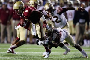 CHESTNUT HILL, MA - SEPTEMBER 18:  Sherman Alston #6 of the Boston College Eagles is tackled by Trey Marshall #20 of the Florida State Seminoles during the second half at Alumni Stadium on September 18, 2015 in Chestnut Hill, Massachusetts.  (Photo by Maddie Meyer/Getty Images)