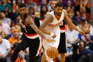 PHOENIX, AZ - JANUARY 21:  Dorell Wright #1 of the Portland Trail Blazers and Marcus Morris #15 of the Phoenix Suns during the NBA game at US Airways Center on January 21, 2015 in Phoenix, Arizona.  The Suns defeated the Trail Blazers 118-113.  NOTE TO USER: User expressly acknowledges and agrees that, by downloading and or using this photograph, User is consenting to the terms and conditions of the Getty Images License Agreement.  (Photo by Christian Petersen/Getty Images)